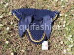 Horse cap with ear flaps and decoration with double yellow braid
